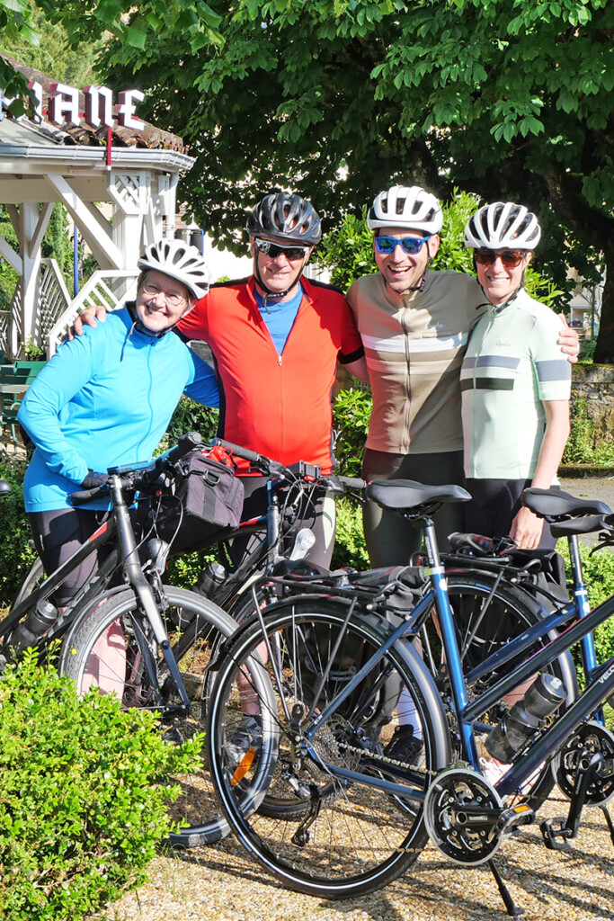 A group of cyclists pose for a photo
