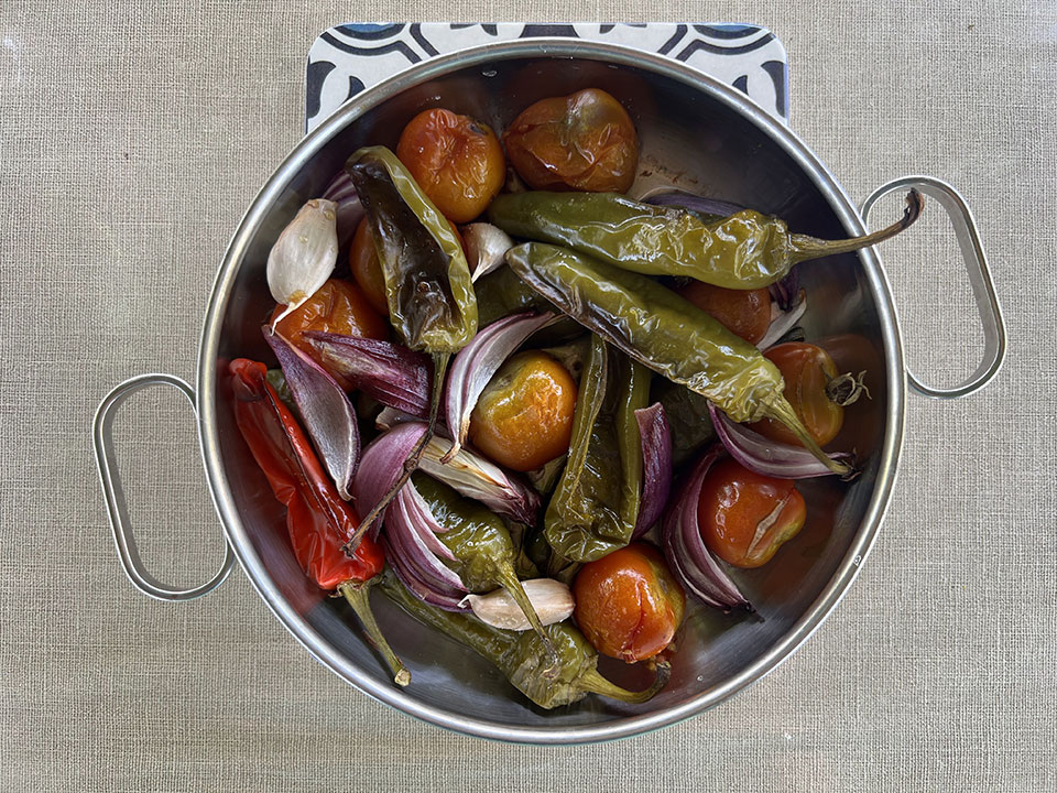 Fried summer vegetables peppers, tomatoes, onions