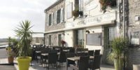 Façade de l’hôtel aux 13 arches à Portbail